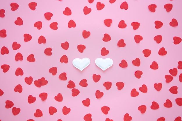 Free photo valentine39s day background with many small hearts flat lay