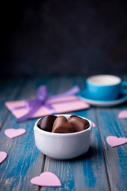 Valentines day chocolates in cup with copy space