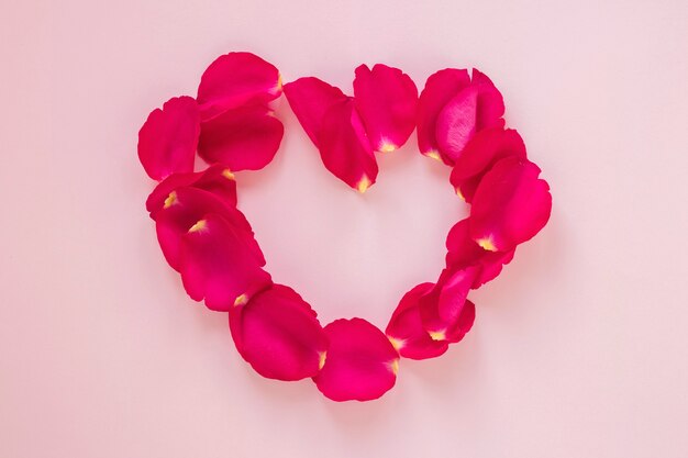 Valentines day heart shape of rose petals