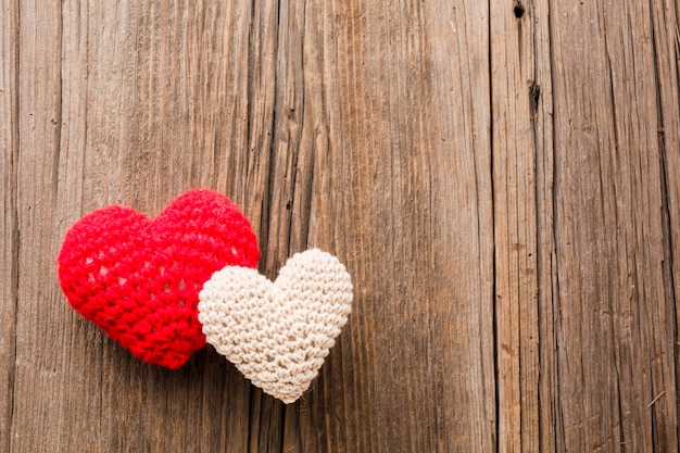 Valentines day ornaments on wooden background and copy space