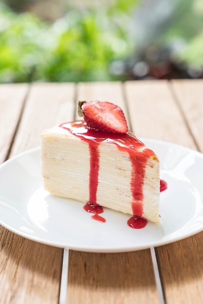 vanilla crape cake with strawberry sauce