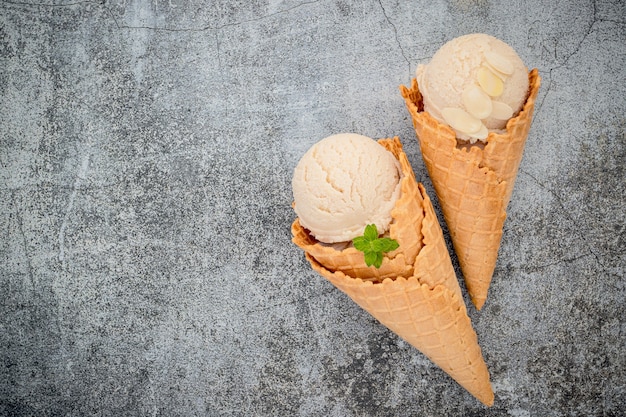 Vanilla ice cream flavor in cones setup on concrete