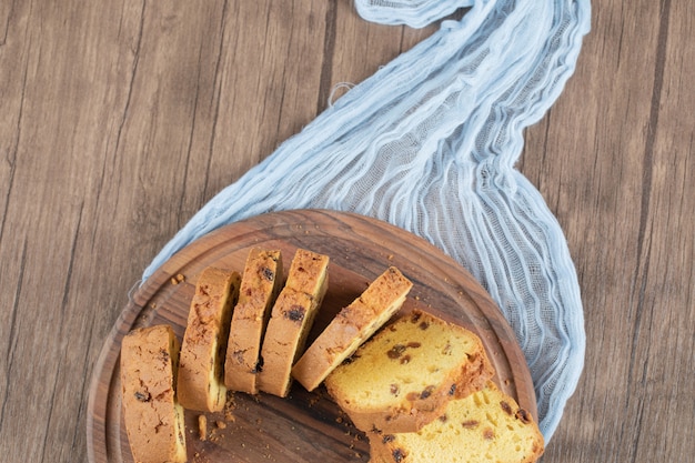 Vanilla pie isolated on a rustic wooden platter