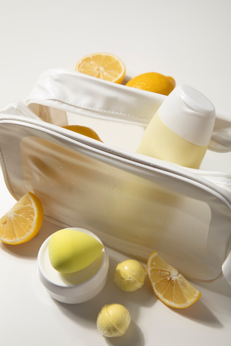 Free Photo vanity case and citrus arrangement  high angle