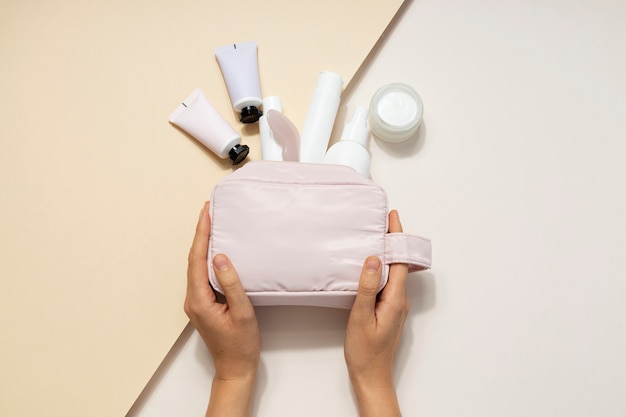 Vanity case and items on table flat lay