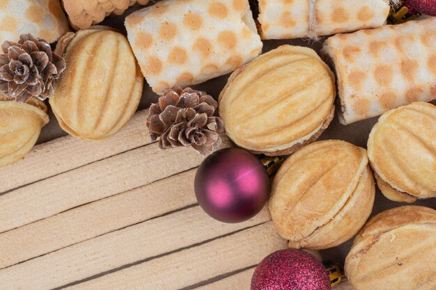 Variety of biscuits and Christmas ornaments on close up view. 