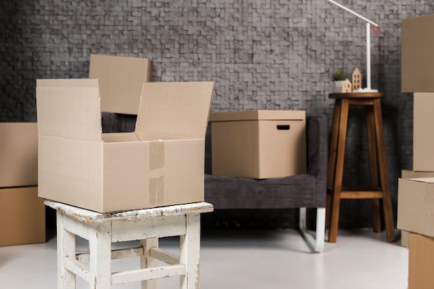 Free photo variety of cardboard boxes ready to be moved