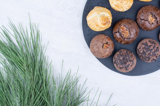 Variety of delicious cookies on black board. High quality photo