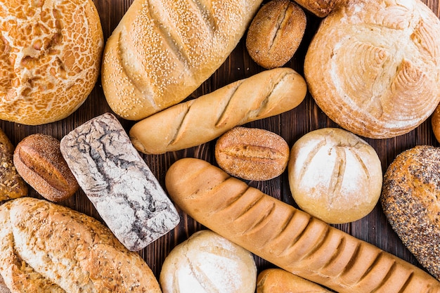 Variety of freshly baked bread on table