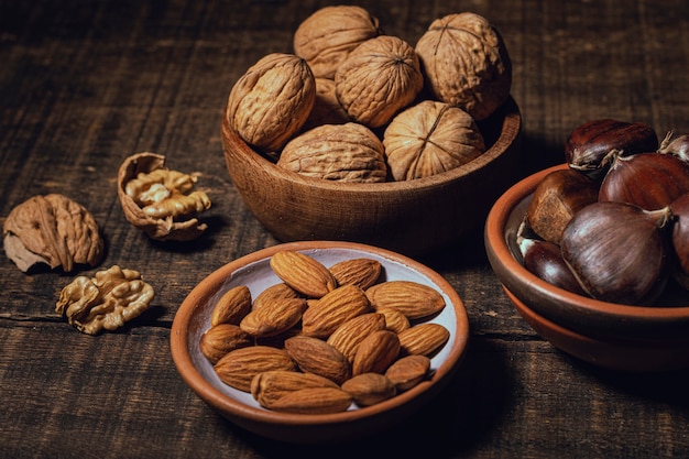 Free photo variety of healthy snacks in bowls