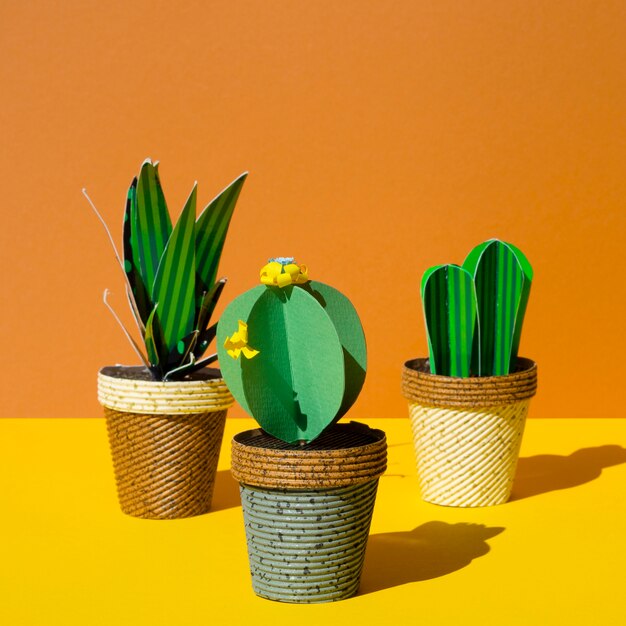 Variety of origami paper cacti in pots
