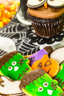 Variety of sweets prepared as halloween treats.