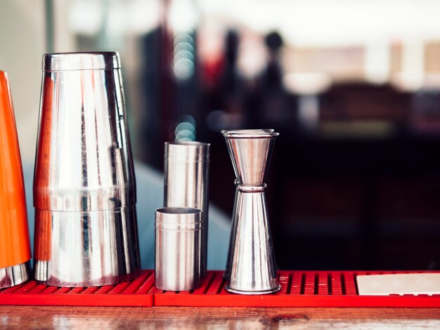 Various bar utensils on counter