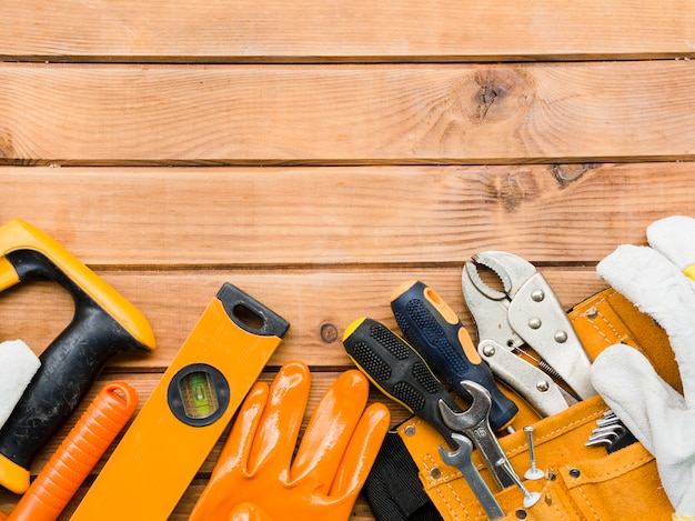 Various carpentry tools on wooden table