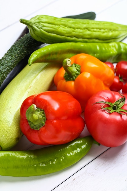 Free photo various colorful vegetables on white wooden table