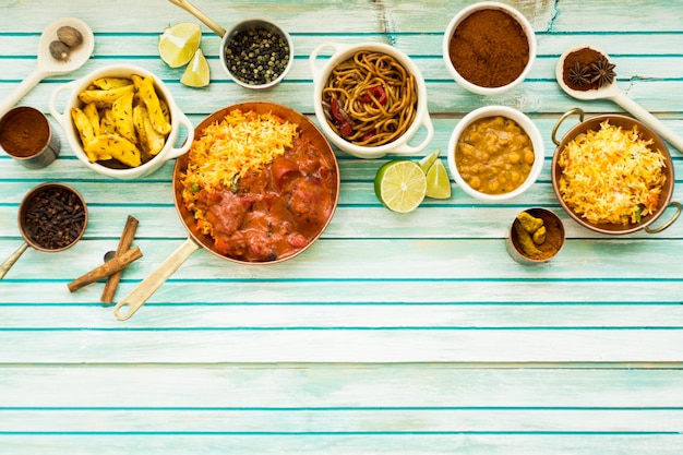 Various dishes and spices on table