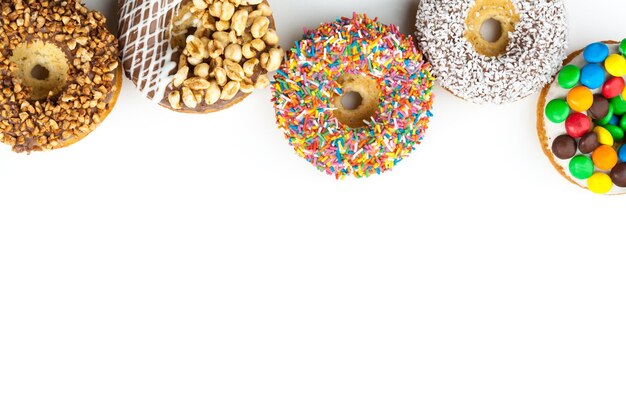 Various donuts on white background