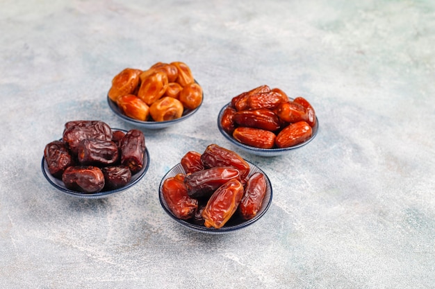 Free photo various of dried dates or kurma.