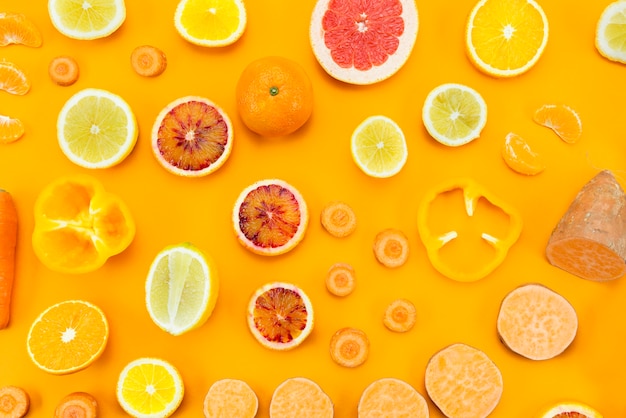 Various exotic fruits on yellow background