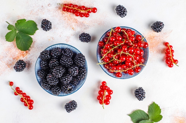 Various fresh summer berries,blueberries,red currant,strawberries,blackberries,top view.