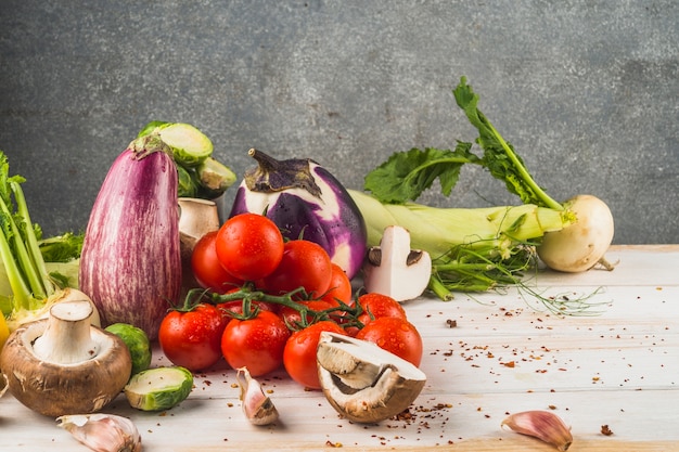 Various healthy vegetables on wooden surface