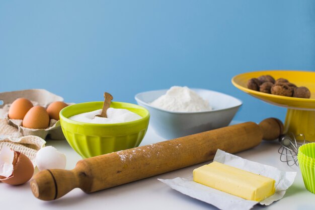 Various ingredients for making cake on table