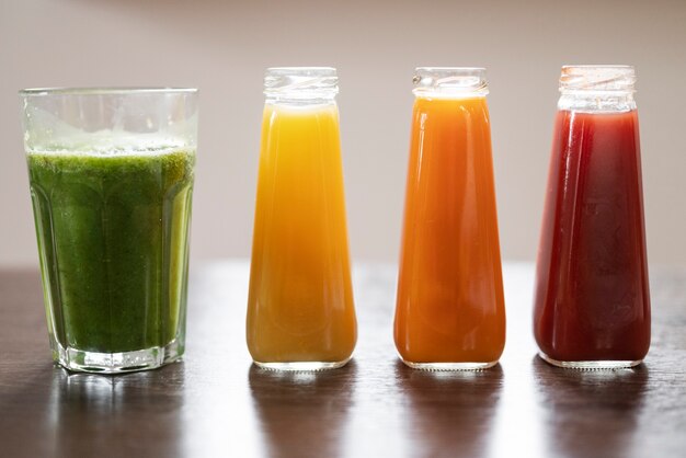 Various juice recipe in glass containers