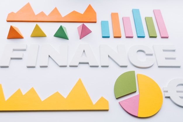 Free photo various multi colored graph surrounding finance word on white background