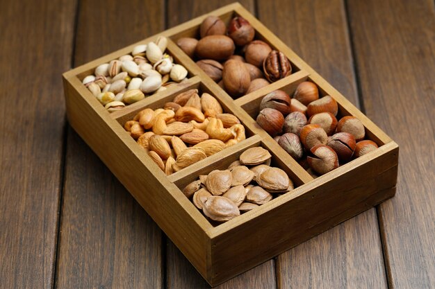 Various nuts in wooden box