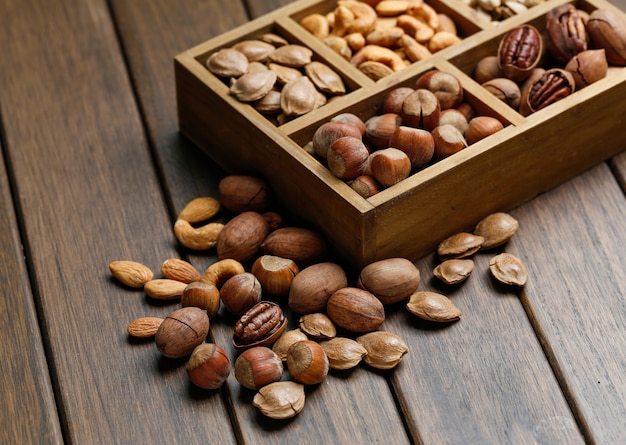 Various nuts in wooden box