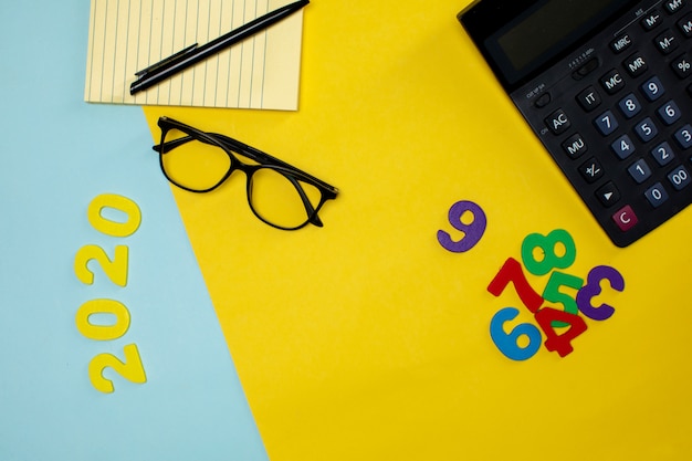 Various office tools and digit figures on the table