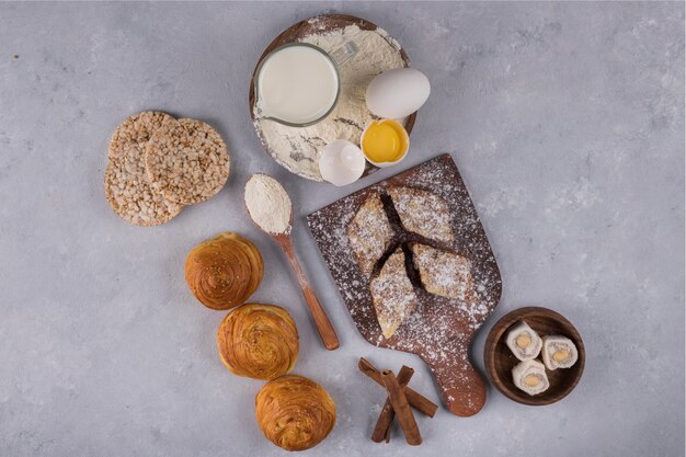 Various pastries and ingredients on the table