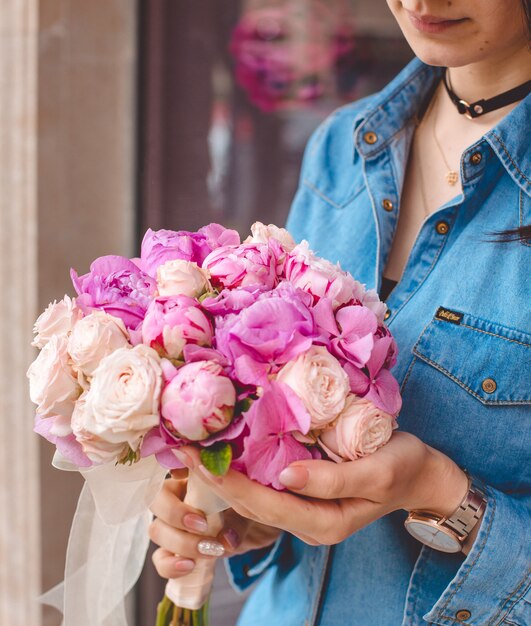 various roses in girl hands