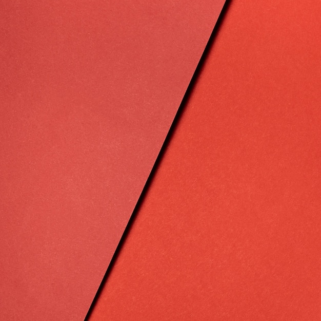 Various shades of red paper close-up