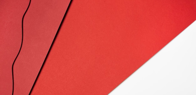 Various shades of red paper