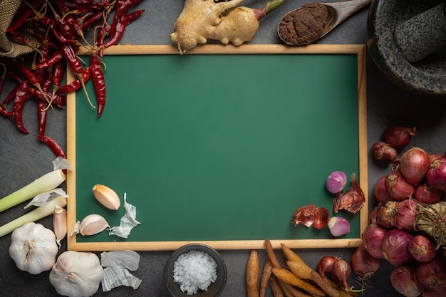 Various spices and herbs for cooking on black