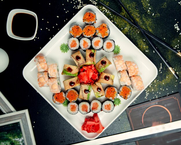 Various sushi rolls on plate