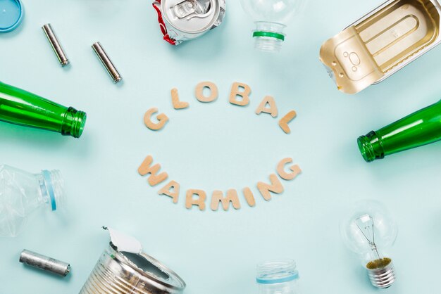 Various trash around Global warming lettering