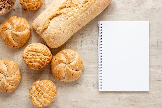 Various types of bread and a notebook