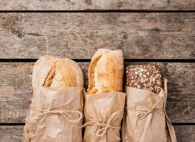 Various types of bread wrapped in paper