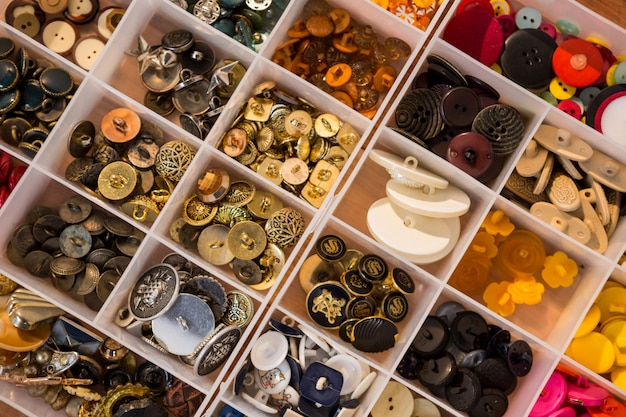 Various types of buttons in a box