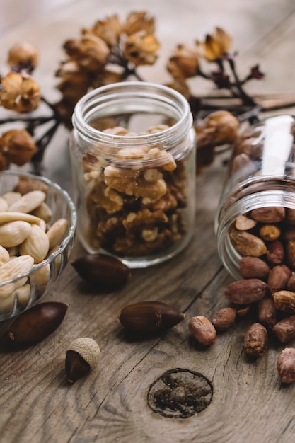 Various types of nuts in glasses