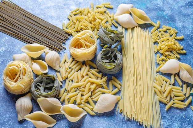 Various types of uncooked pasta.