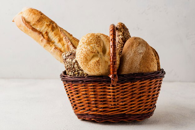 Various white and whole-grain bread front view in basket