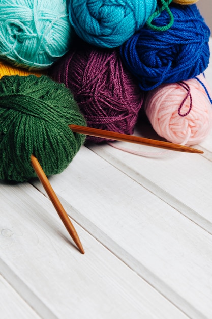 Various wool balls and needles