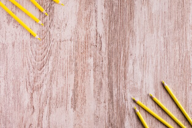 Various yellow pencils on desk