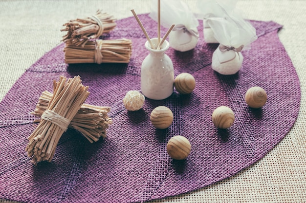 Free photo vase and wooden balls