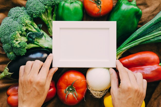 Vegetable composition with hands and frame