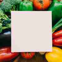 Free photo vegetable composition with paper