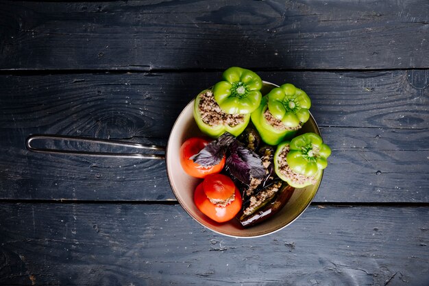 Vegetable dolma with meat stuffings in a pan.